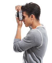 Image showing Photographer, man and profile with digital camera in studio for photoshoot, creative production and content creation on white background. Journalist, cameraman and photography for paparazzi magazine