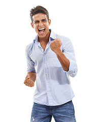 Image showing Business man, winner and yes in studio for success, power or achievement with startup career celebration. Excited person in portrait with fist, wow and winning, goals or news on a white background