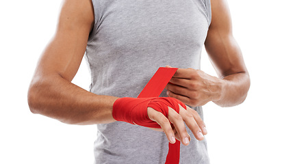Image showing Hand wrap, kickboxing and person ready for fitness in studio, sports and martial arts isolated on white background. Safety for fight, boxer and MMA fighter in training with exercise and power