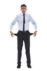 Image showing Business man, empty pockets and studio portrait for financial crisis in recession by white background. Entrepreneur, employee and person with no money, stress and inflation in economy, pants and poor