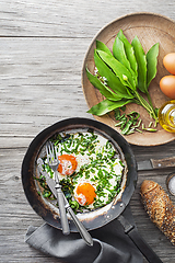 Image showing Fried egg wild garlic