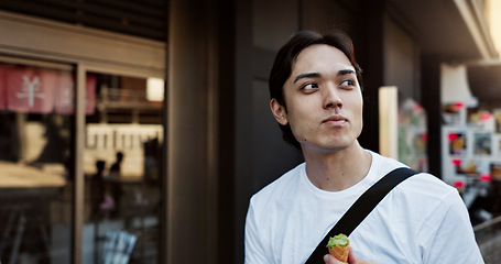 Image showing Walking, travel and Japanese man with ice cream in city on vacation, holiday and adventure in Yokohama town. Summer, weekend trip and person with dessert, sweet snack and cone for tourism destination