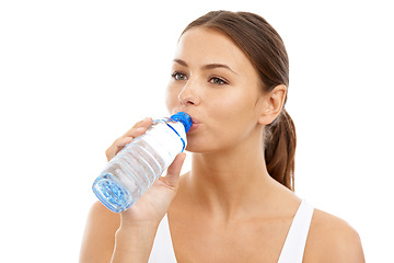 Image showing Fitness, woman or drinking water in studio for exercise break, energy or detox for healthy recovery on white background. Athlete, thinking and bottle of liquid for hydration, nutrition or sports diet