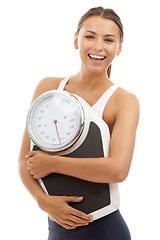 Image showing Studio portrait, smile and woman with scale to track weight loss progress, exercise or body transformation goals. Wellness, slim and model pride in BMI, diet or fitness on white background