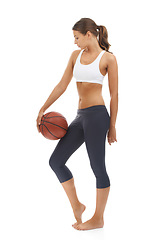 Image showing Woman, basketball and sport exercise in studio for workout performance, athlete or white background. Female person, fitness and competition or mockup space for game goal for cardio, health or play