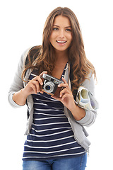 Image showing Photography, travel and young woman in studio for tourism photoshoot with camera. Adventure, creative and female tourist photographer with media project on journey isolated by white background.