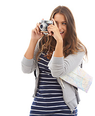 Image showing Photography, travel and young woman in studio working for photoshoot with camera. Tourist, creative and photographer sightseeing with map on vacation, holiday or weekend trip by white background.