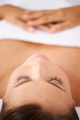 Image showing Woman, face and massage at spa, skin and treatment for wellness, zen and beauty with stress relief and self care. Relax, bodycare and health with holistic healing, calm and peace at luxury resort