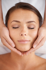 Image showing Woman, spa or face massage from above for beauty, skincare treatment or dermatology at cosmetics salon. Calm client relax at wellness resort for reiki, facial acupressure or peaceful holistic therapy