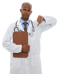 Image showing Studio, black man and portrait of doctor with thumbs down for bad medical results, medicine report or disagreement vote. Clipboard, no emoji icon or surgeon with negative feedback on white background