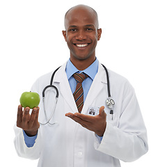 Image showing Portrait, doctor and happy black man with apple for fruit diet, healthcare nutrition or vitamin c benefits. Studio, vegan food and African nurse smile for health recommendation on white background