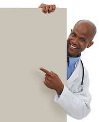 Image showing Happy doctor, portrait and black man point at poster, hospital promo or medicine announcement. Mockup studio space, advertising banner and African surgeon with healthcare sign on white background