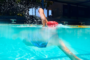 Image showing Sports, water splash or woman in swimming pool for workout, competition training or energy in gala. Fitness, female swimmer and fast athlete diving for cardio exercise, championship and race practice