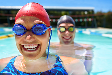 Image showing Goggles, portrait or happy couple in swimming pool for sports training, workout or teamwork for fitness. Face, swimmers or athletes in exercise for support, health or wellness with smile in water