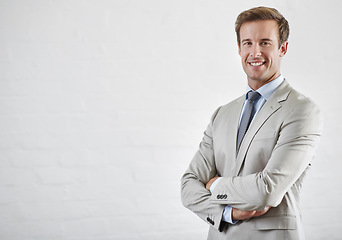 Image showing Portrait, smile and business man with arms crossed for pride in career on mockup space. Confident professional lawyer, face and attorney worker in suit isolated on white wall background in Australia