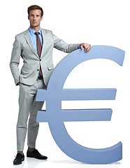 Image showing Portrait, Euro currency icon and man with investment, finance or investor isolated on white studio background. Person, employee or model with accountant, trader or stock market with economy or symbol