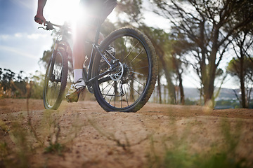 Image showing Person, cyclist and mountain bicycle for exercise, training and energy for rider, cycling and sport. Outdoor, hobby and fitness in nature, trail and active for wellness, helmet and physical workout