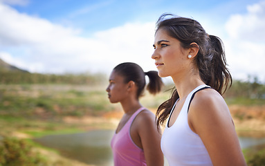 Image showing Woman, friends and nature hiking for adventure workout, explore or fitness. Female people, forest and training wellness for outdoor physical activity in countryside for trail running, cardio or calm