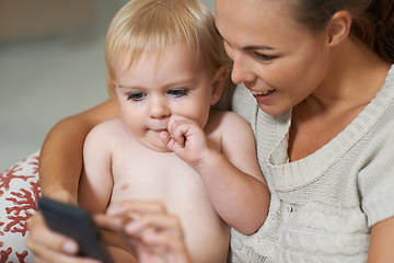 Image showing Mother, baby and phone or smile with internet for social media, video streaming or cartoons for development. Family, woman and toddler or child with smartphone for scroll, search and entertainment