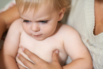 Image showing Baby, closeup and parent holding boy with love and comfort in morning or home. Infant, kid and bonding together with care of person for wellness, development and growth of relationship as family