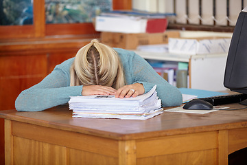 Image showing Tired, teacher or sleeping at desk with paperwork, stress or burnout for documents deadline in classroom. School, woman or exhausted professor with fatigue or head down in nap on table for resting