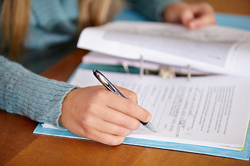 Image showing Hands, teacher and marking a test with education, review and feedback in a classroom, learning and study. Person, educator or woman with pen, checking exams or writing with results, closeup or school
