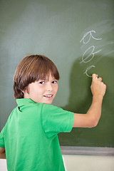 Image showing Portrait, knowledge and boy drawing on a chalkboard for child development, creativity and art for learning. Academic, face and kid student writing with information in the classroom and answers