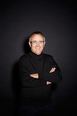 Image showing Portrait of mature man in studio with smile, arms crossed and happy with dark fashion style. Pride, relax and senior person isolated on black background with expert knowledge, glasses and wisdom.