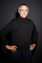 Image showing Portrait of mature man in studio with confidence, glasses and dark fashion style in retirement. Pride, relax and senior person isolated on black background with expert knowledge, mystery and wisdom.