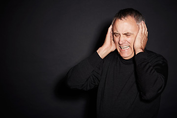 Image showing Frustrated mature man in studio with stress, anxiety and dark fashion style on mockup space. Anger, fear and senior person isolated on black background with headache, mind and mental health burnout