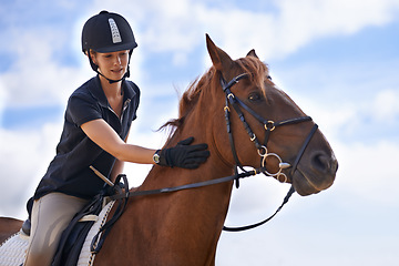 Image showing Love, horse riding or equestrian in countryside or outdoor with rider or jockey for recreation or adventure. Relax, sport or woman with healthy pet animal for training, exercise or wellness on farm