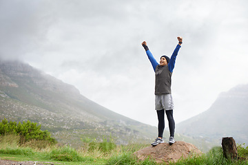 Image showing Athlete, mountain peak space or hands up for celebration in training, exercise or workout success. Excited man, sky mockup or hiker with fun energy, gratitude or freedom in nature for fitness goals