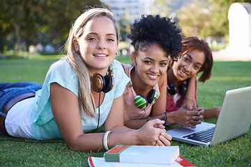 Image showing Portrait, laptop or students on grass at college, campus or together with online course, smile or group. University, relax or happy friends bond with support, teamwork or diversity in education