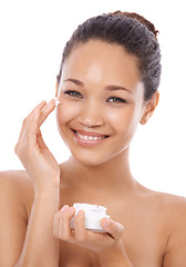 Image showing Happy woman, portrait and face cream for skincare, beauty or treatment against a white studio background. Face of female person or model smile with sunscreen creme, skin product or spa cosmetics