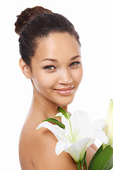 Image showing Woman, portrait and flower skincare in studio, smiling and happy with facial treatment by white background. Female person, face and wellness or cosmetics and dermatology, beauty and luxury or organic