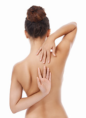 Image showing Woman, back and naked in studio for body care, skincare and self love or treatment by white background. Female person, nude and wellness or cosmetics and dermatology, beauty and luxury grooming