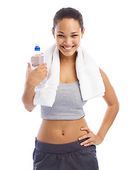 Image showing Happy woman, portrait and water bottle with towel in fitness isolated against a white studio background. Female person or athlete smile with natural mineral drink for workout, hydration or exercise