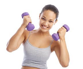 Image showing Woman, portrait and dumbbells for fitness in studio, exercise and happy for wellness by white background. Female person, face and weightlifting equipment or tools, biceps and training for strong body