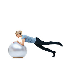 Image showing Woman, gym ball or balance in studio for workout, wellness or mobility exercise on white background. Female athlete, training equipment or fitness for mockup space, stretching legs or flexibility