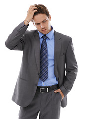 Image showing Studio, thinking and business man stress over corporate problem, company disaster or work mistake. Anxiety, crisis and professional person worry for risk, fail or error isolated on white background