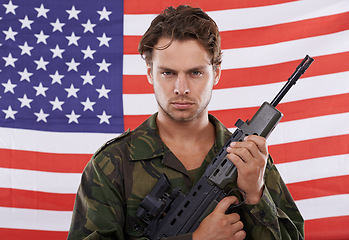 Image showing Military, Usa and gun with portrait of man in studio for war, conflict and patriotism. Army, surveillance and security with person on American flag for soldier, battlefield and veteran training