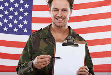 Image showing Military, usa and recruitment with portrait of man in studio for war, conflict and patriotic. Army, mockup and page with person and clipboard on American flag for soldier, battlefield and veteran