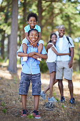 Image showing Family, portrait or happy kids hiking in forest to relax or bond on holiday vacation together in nature. Sibling children, black people or African parents in woods trekking on outdoor adventure