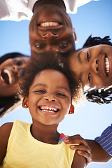 Image showing Happy family, portrait and huddle for bonding together, parents and kids with pov, blue sky and outdoor. Holiday, carefree and weekend with smile, childhood memories and cheerful for vacation