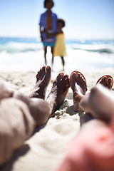 Image showing Feet of family on beach, relax and holiday with children, waves and sunshine on tropical island travel together. Black man, woman and kids on ocean vacation in summer with adventure, peace and sky.