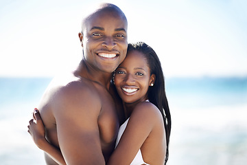 Image showing Smile, hugging and portrait of black couple at the beach for valentines day vacation, holiday or adventure. Happy, embracing and African man and woman on a date by the ocean on weekend trip together.