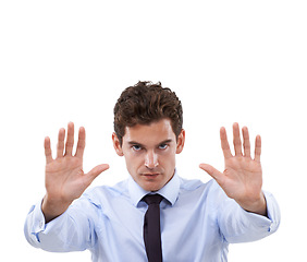 Image showing Businessman, hand and stop in studio portrait with forbidden warning, rejection and negative in mockup. Face, palm and protest emoji or defence sign, deny and wait or frustrated by white background