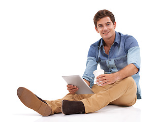 Image showing Tablet, mockup and portrait of happy man on studio floor with social media, chat or scroll on white background. Space, face or male student with digital, app or search, streaming or upskill training