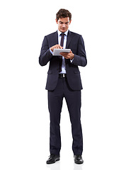 Image showing Business man, studio and typing on tablet in online research, stock market investment or trading software. Professional trader or corporate analyst scroll on digital technology on a white background
