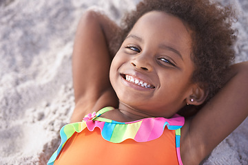 Image showing Happy, child and portrait on beach sand for childhood and summer holiday with sunshine in nature. Black girl, young and smile face to relax on vacation, cape town and seaside for wellness in outdoor